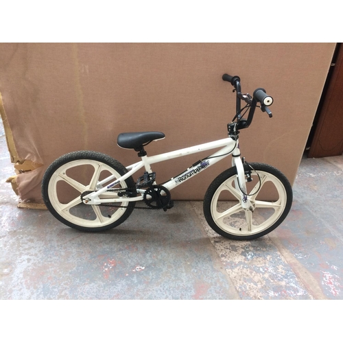 3 - A WHITE REDEMPTION BOYS BMX WITH PLASTIC MAG WHEELS