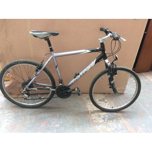 4 - A BLACK AND GREY PYTHON DAYTONA GENTS MOUNTAIN BIKE WITH FRONT SUSPENSION AND 18 SPEED GEAR SYSTEM