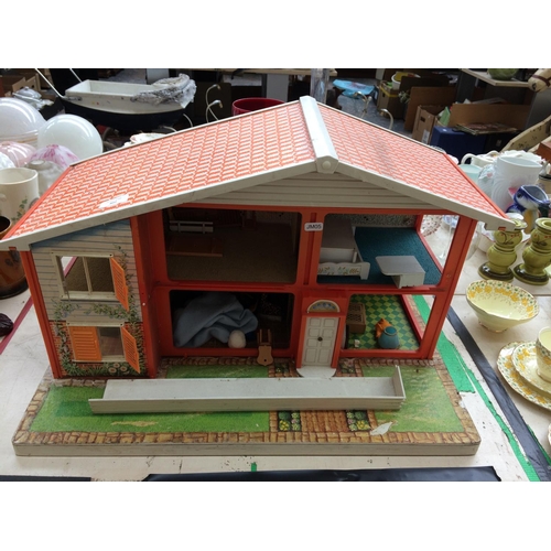 402 - A VINTAGE CHILDS DOLLS HOUSE WITH CONTENTS