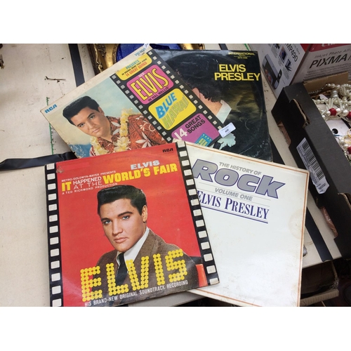 408 - TWELVE VINTAGE LP RECORDS TO INCLUDE EIGHT ELVIS PRESLEY RECORDS, A RECORD OF AN ELVIS SEANCE AND OT... 