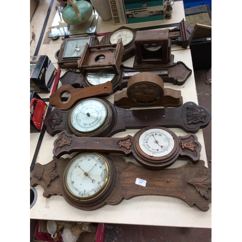 414 - A LARGE COLLECTION OF VINTAGE CLOCKS AND BAROMETERS