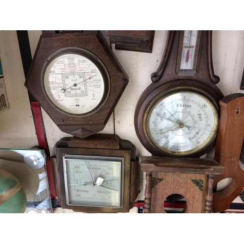 414 - A LARGE COLLECTION OF VINTAGE CLOCKS AND BAROMETERS