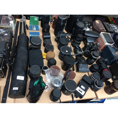 418 - A LARGE COLLECTION OF CAMERAS AND LENSES