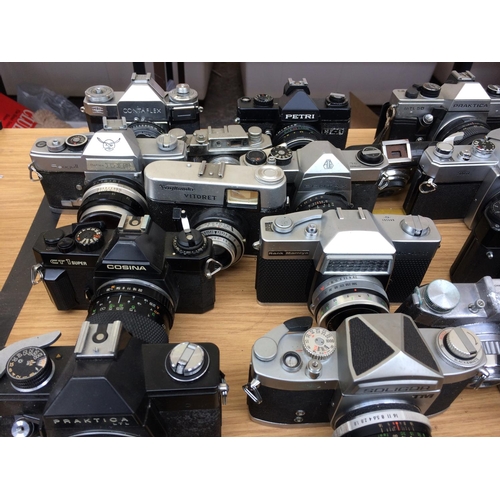 421 - AN EXTENSIVE COLLECTION OF APPROXIMATELY 41 VINTAGE CAMERAS AND LENSES