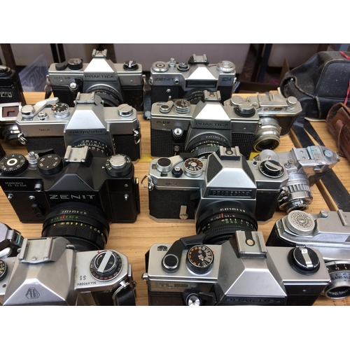 421 - AN EXTENSIVE COLLECTION OF APPROXIMATELY 41 VINTAGE CAMERAS AND LENSES