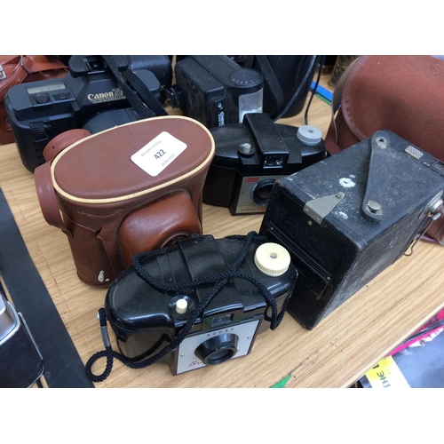 422 - A COLLECTION OF CASED CAMERAS AND LENSES TO INCLUDE BROWNIE CAMERA, OPERA BINOCULARS ETC