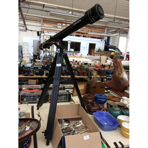 449 - A TASCO ASTRONOMICAL TELESCOPE ON TRIPOD STAND