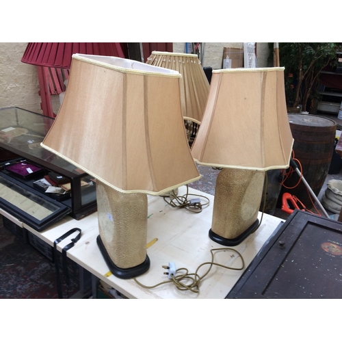 463 - THREE LAMPS TO INCLUDE TWO MATCHING CERAMIC LAMPS WITH SHADES AND ONE OTHER CERAMIC LAMP WITH SHADE