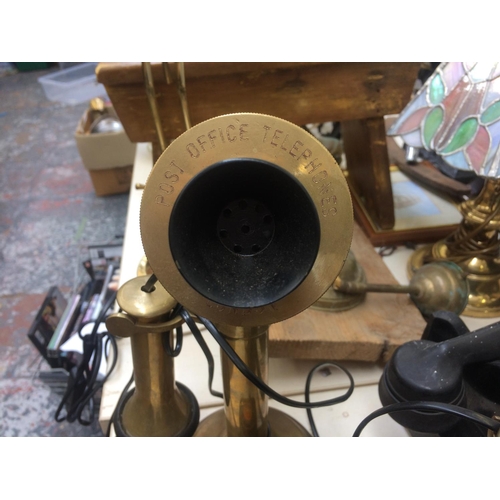 488 - THREE ITEMS TO INCLUDE TWO BRASS CANDLESTICK TELEPHONES AND A VINTAGE BRASS MINERS LAMP