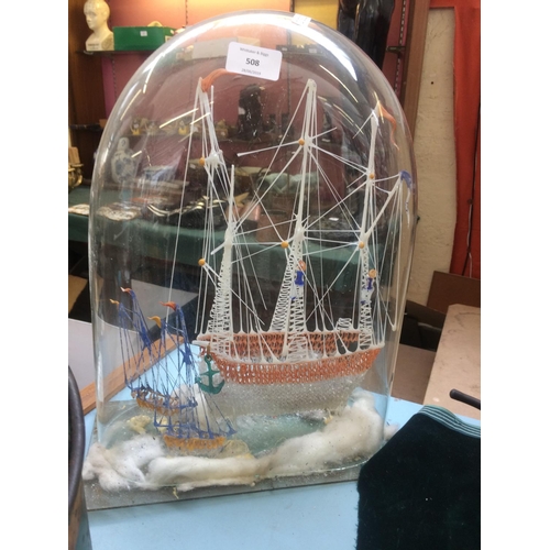 508 - A BLOWN GLASS MODEL SHIP IN GLASS DOME