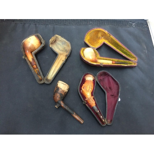 551 - FOUR ANTIQUE SMOKING PIPES