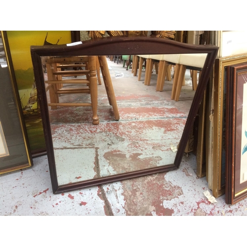 559 - A TEAK FRAMED WALL HANGING MIRROR