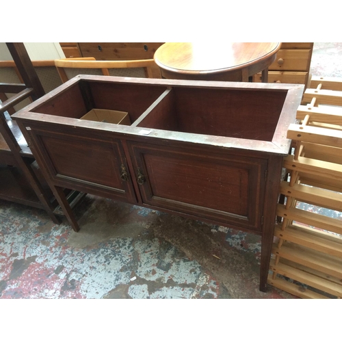 598 - A MAHOGANY WASH STAND WITH TWO DOORS (MISSING TOP)