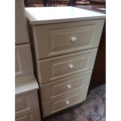 607 - A MODERN WHITE CHEST OF FOUR DRAWERS