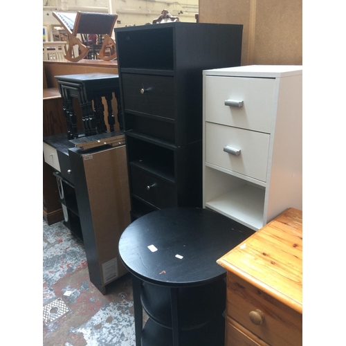 636 - NINE ITEMS TO INCLUDE THREE BLACK ASH BEDSIDE CABINETS, BLACK COFFEE TABLE, WHITE CABINET WITH TWO D... 