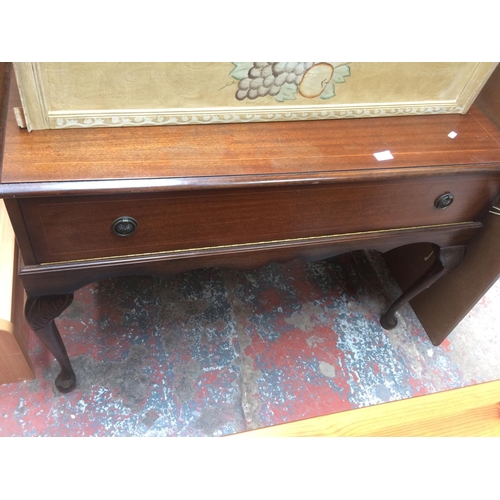 652 - A MAHOGANY STEREO CABINET WITH FALL FRONT