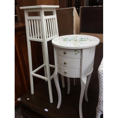 658 - A SMALL WHITE CHEST OF THREE DRAWERS WITH ROSE PAINTED DESIGN AND A WHITE PAINTED PLANT STAND