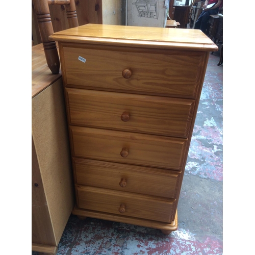 669 - A MODERN PINE CHEST OF FIVE DRAWERS