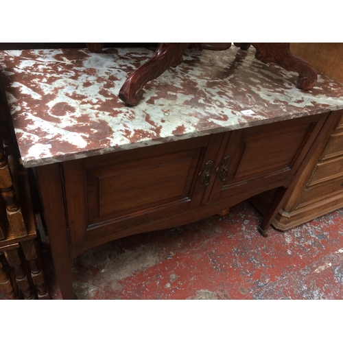 683 - A MAHOGANY MARBLE TOP WASHSTAND WITH TWO DOORS