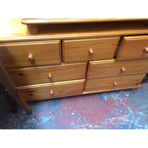 686 - A MODERN PINE CHEST OF THREE SHORT OVER FOUR LONG DRAWERS