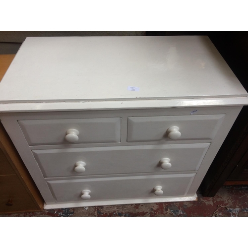 695 - A WHITE PAINTED PINE CHEST OF TWO SHORT OVER TWO LONG DRAWERS