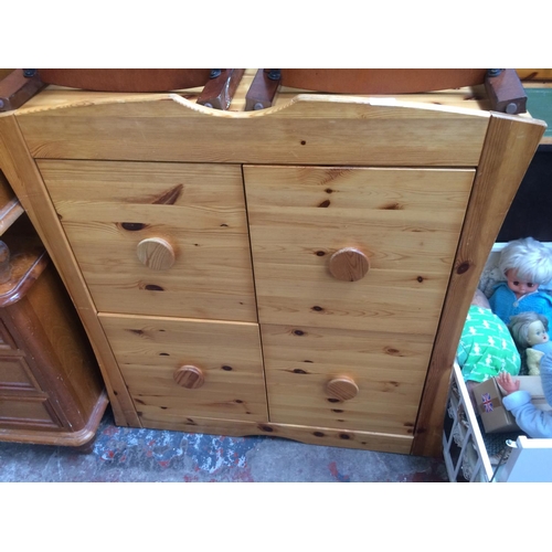 704 - A MODERN PINE CHEST OF FOUR DRAWERS