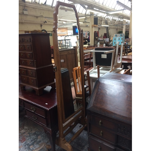 727 - A BURR WALNUT CHEVAL MIRROR (MEASURING 70