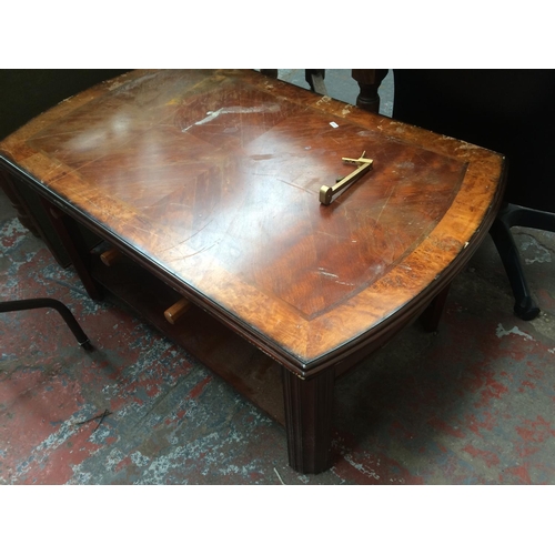 769 - A VINTAGE BURR WALNUT GAMES TABLE