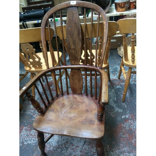 780 - A GOOD QUALITY 19th CENTURY ELM SPINDLE BACK WINDSOR ARMCHAIR