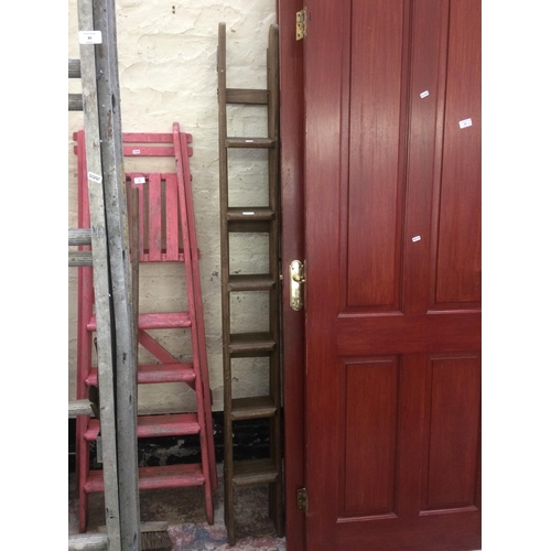 87 - A SET OF SINGLE LEG SIX STEP WOODEN STEP LADDERS