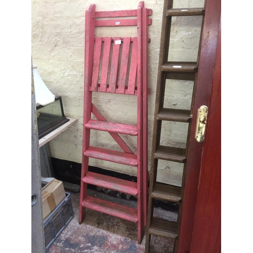 88 - A SET OF PINK PAINTED FIVE STEP WOODEN STEP LADDERS