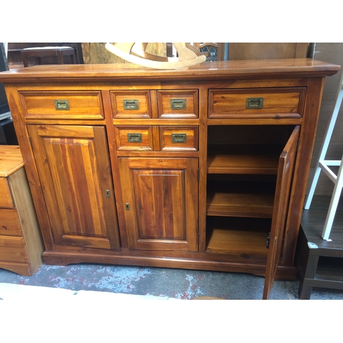 661 - A GOOD QUALITY LARGE INDIAN HARDWOOD/ SHEESHAM WOOD SIDEBOARD WITH THREE DOORS, TWO LONG DRAWERS, TW... 