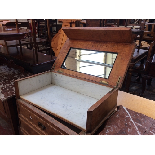 681 - A FRENCH BURR WALNUT CONCEALED DRESSING TABLE WITH MARBLE INSERT