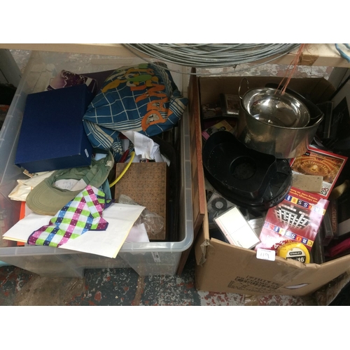 119 - A LARGE MIXED LOT TO INCLUDE BAGS AND BOXES CONTAINING CLOTHING, FOOTWEAR, GAMES, ORDNANCE SURVEY MA... 