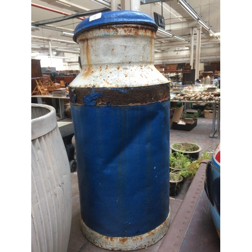 127 - A BLUE AND WHITE PAINTED METAL MILK CHURN