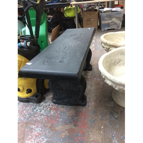 153 - BLACK PAINTED RECONSTITUTED STONE GARDEN BENCH WITH SWAN DESIGNED TOP