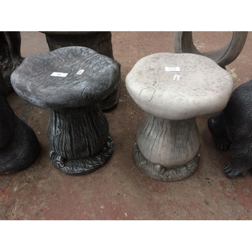 166 - TWO RECONSTITUTED STONE TOADSTOOL GARDEN SEATS TO INCLUDE ONE DARK AND ONE LIGHT