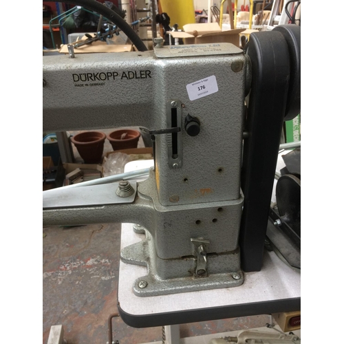 176 - A GREY DURKOPP ADLER INDUSTRIAL SEWING MACHINE AND TABLE