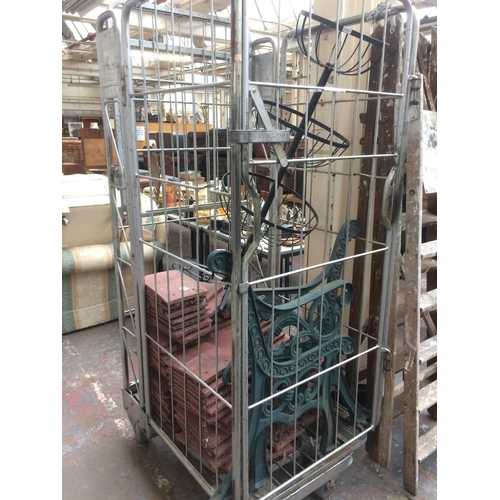 181 - A MIXED LOT TO INCLUDE A PAIR OF CAST IRON ORNATE GARDEN BENCH ENDS, BLACK METAL PLANT STAND AND A L... 