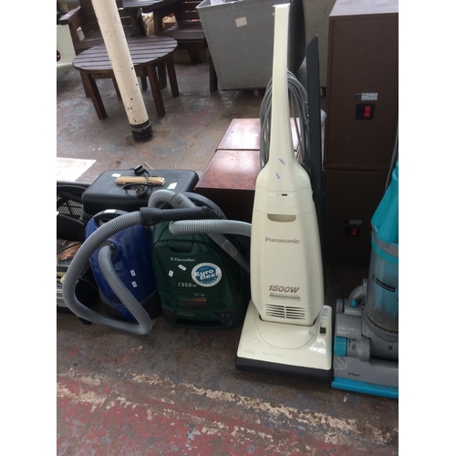 211 - THREE VACUUM CLEANERS TO INCLUDE A PANASONIC UPRIGHT 1500W, GREEN ELECTROLUX CYLINDER AND A BLUE SAM... 