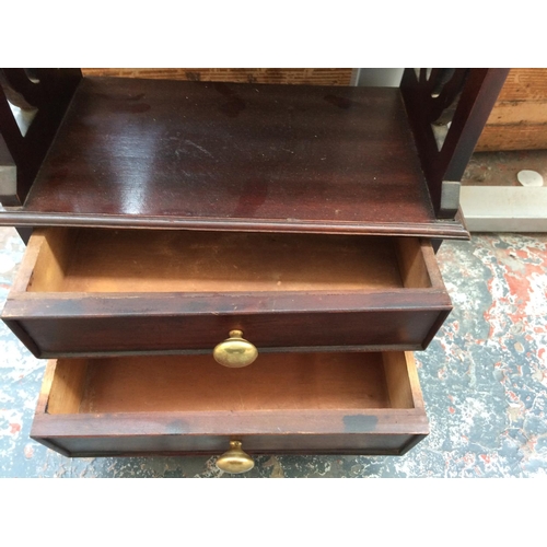 271 - A SMALL MAHOGANY BOOKCASE WITH TWO LOWER DRAWERS AND THREE SHELVES