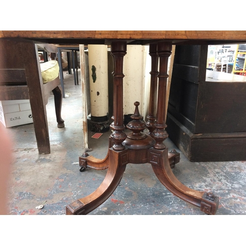 304 - A GOOD QUALITY BURR WALNUT CARD TABLE ON ORNATE CENTRE PEDESTAL SUPPORT