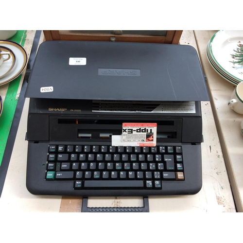 330 - A SHARP PA-3100S ELECTRIC TYPEWRITER