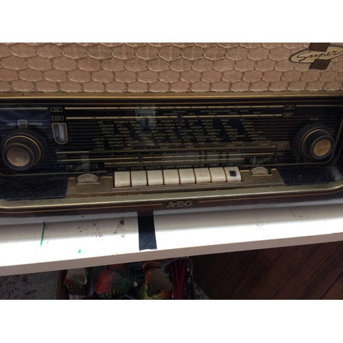 335 - A VINTAGE AEG WOODEN CASED RADIO