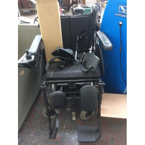 38 - A GREY AND BLACK DAYS ELECTRIC WHEELCHAIR WITH BATTERY AND CHARGER (W/O)