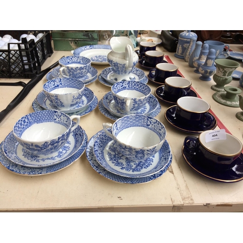 404 - A 22 PIECE BLUE AND WHITE CHINA TEA SET AND A 12 PIECE MARTELL COGNAC COFFEE SET