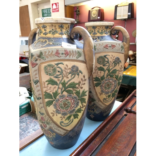 425 - A PAIR OF ORIENTAL CERAMIC VASES