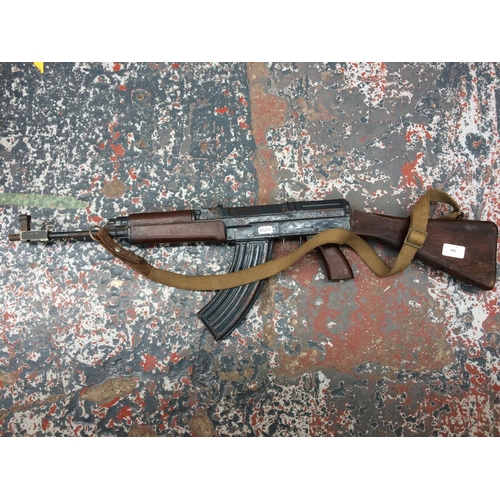 432 - AN AK-47 STAGE PROP RIFLE