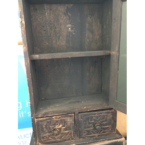 433 - A SMALL ORNATE PAINTED PINE CABINET WITH MIRROR AND TWO DRAWERS