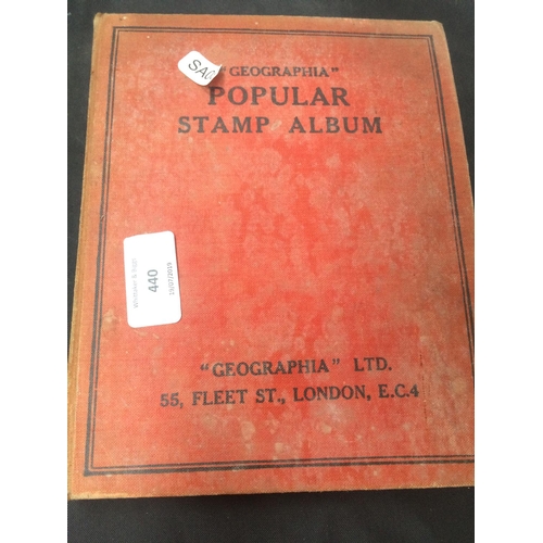 440 - A VINTAGE STAMP ALBUM WITH CONTENTS